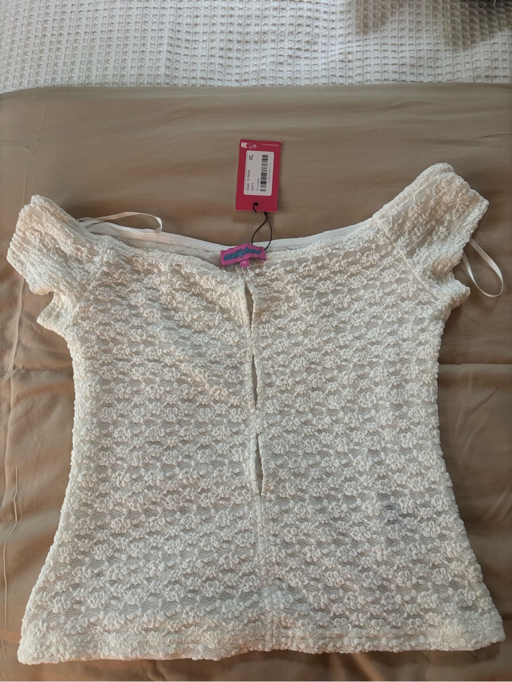 Edikted Cream Lace Off-Shoulder Top with Pink Brand Tag